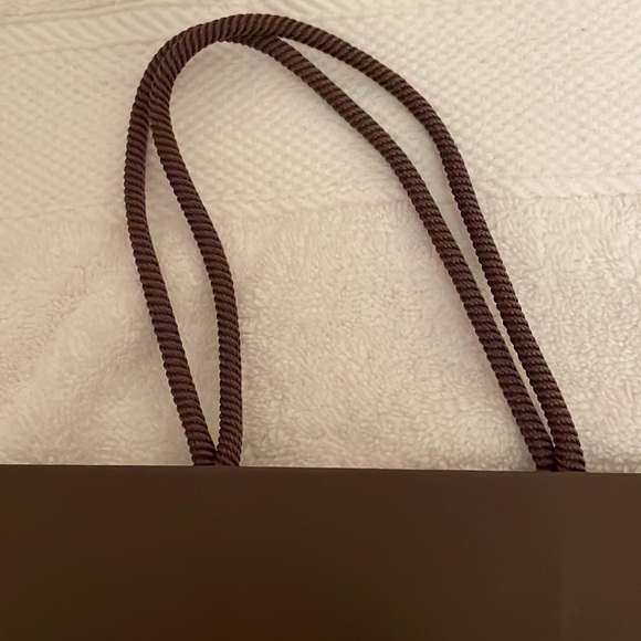 Louis Vuitton authentic gift bag measures approx. 8x 11 inches. Never opened. - Picture 4 of 6